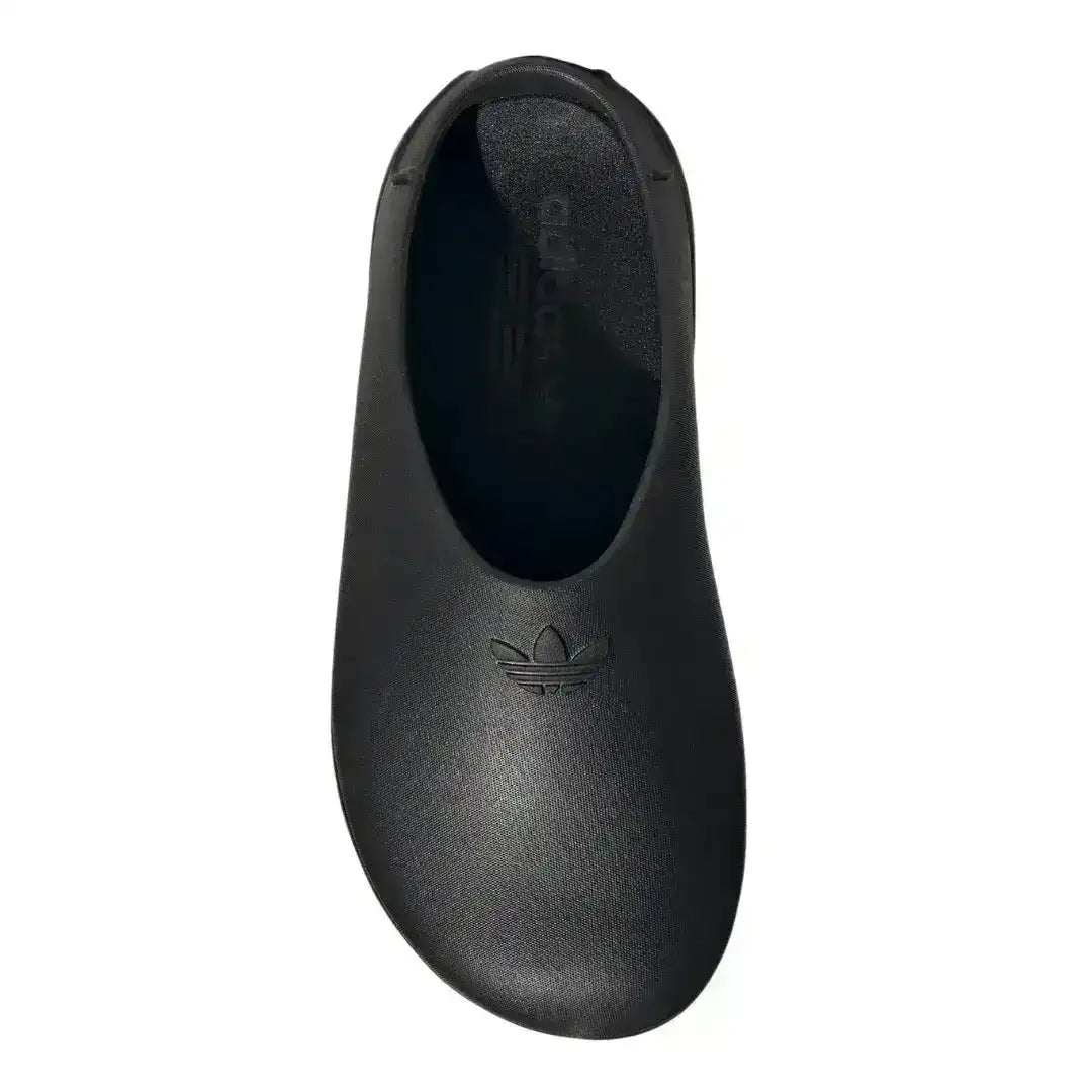 Molded closed-toe clogs with thick rounded soles.
