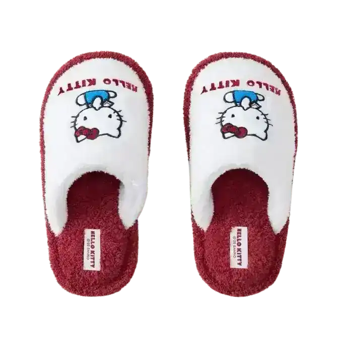 Fuzzy slip-on slippers decorated with a cat-face character.