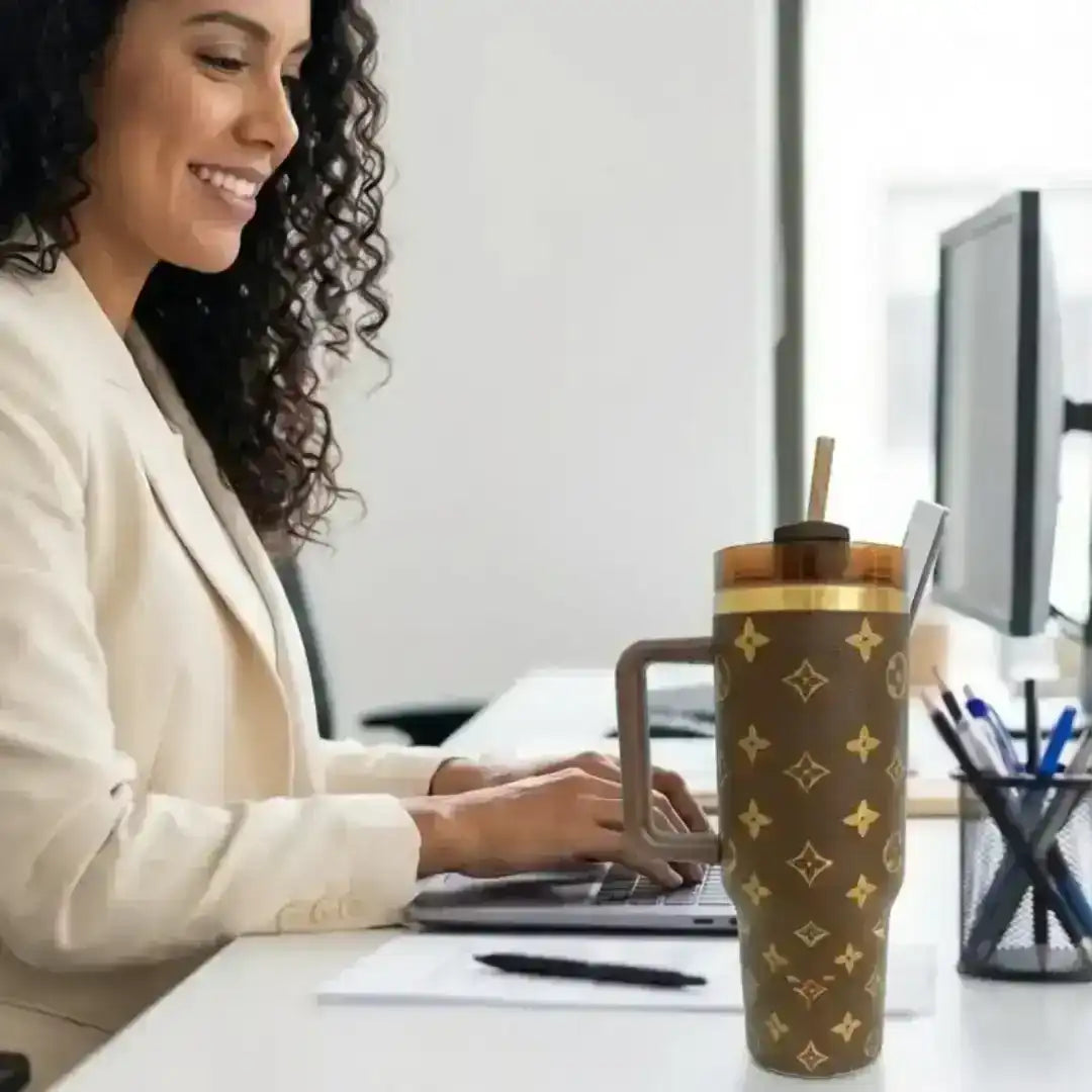 Patterned insulated cup with ergonomic handle and lid