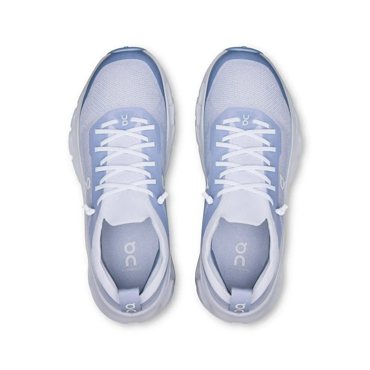 Light blue lace-up sneakers with cutout-style midsoles.
