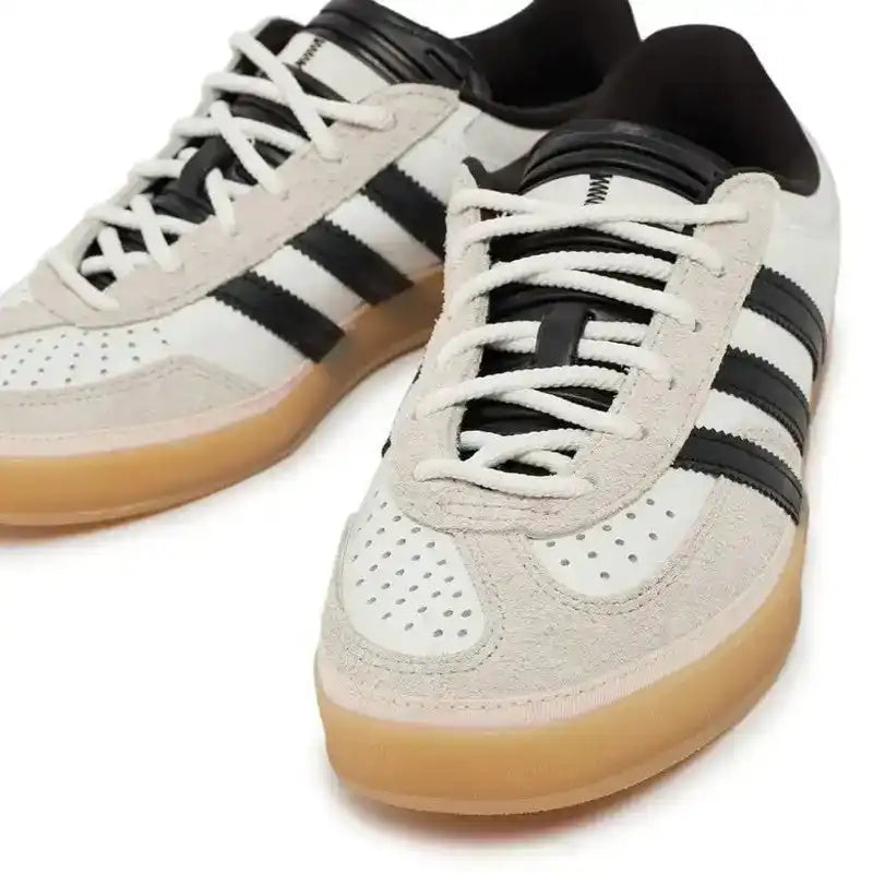 Angled view of Adidas Gazelle Benito showing gum sole and double tongue
