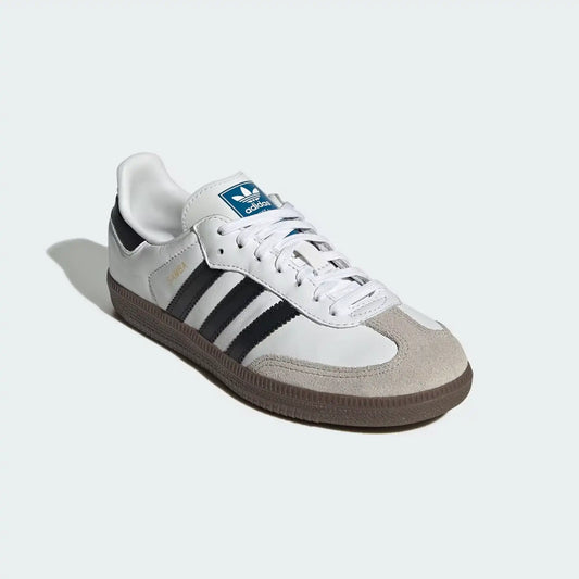 Adidas Samba OG Classic black and white sneaker with gum sole and suede T-toe.