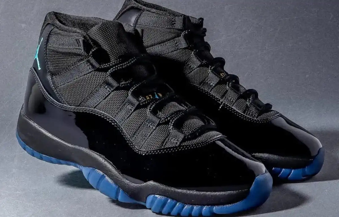 Side profile of Air Jordan 11 Retro Gamma Blue 2025, featuring black patent leather and teal accents.