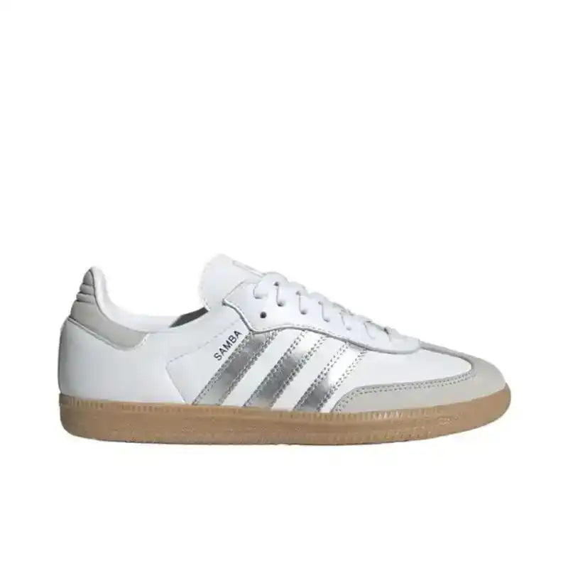 Adidas Samba OG in white leather with silver metallic stripes and grey suede T-toe.