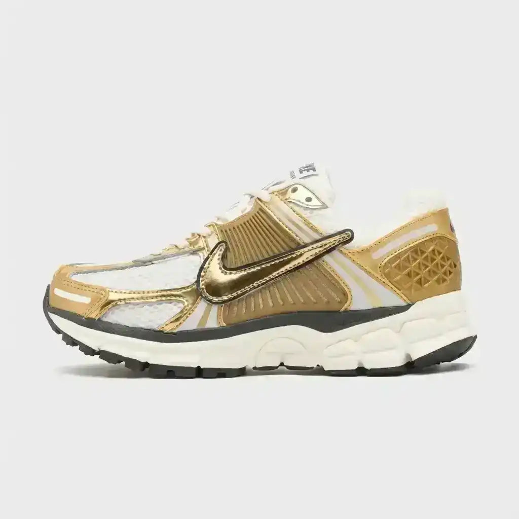 Gold-colored and cream mesh-panel sneakers with sculpted soles.