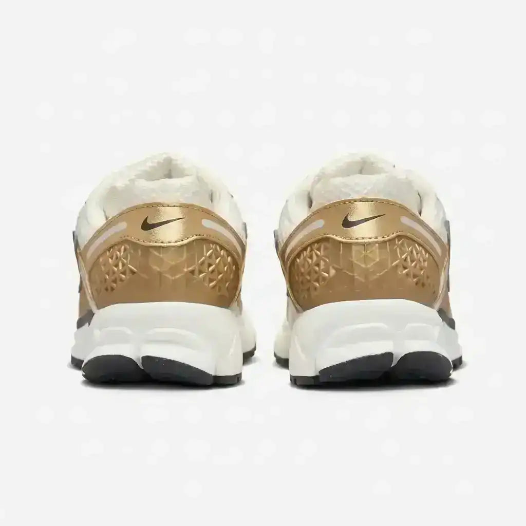 Gold-colored and cream mesh-panel sneakers with sculpted soles.