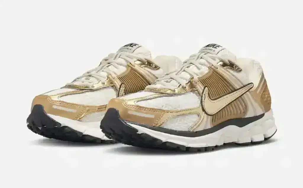 Gold-colored and cream mesh-panel sneakers with sculpted soles.