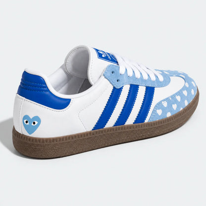 Blue and white heart-pattern low-top sneaker, side view.