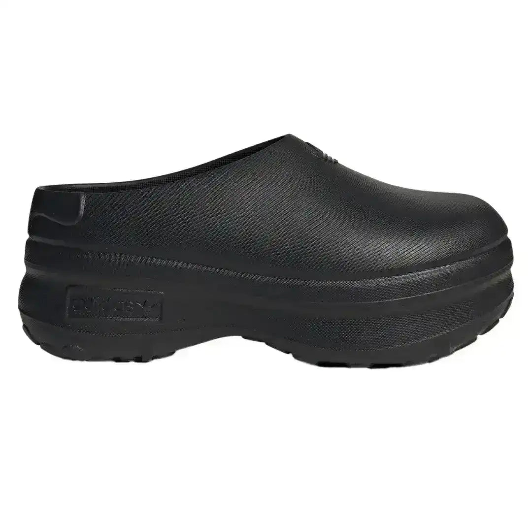 Molded closed-toe clogs with thick rounded soles.