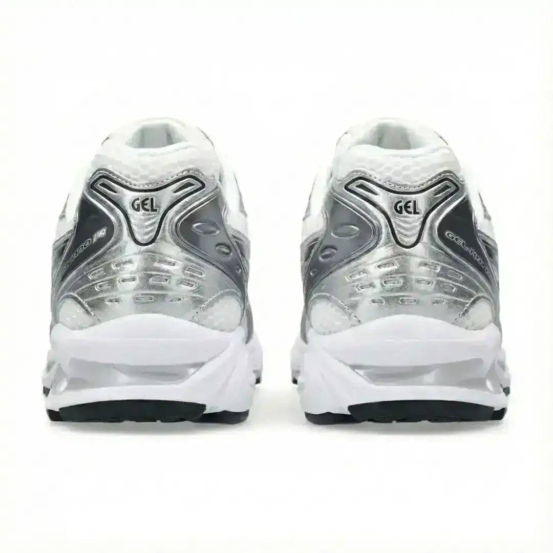 Silver-colored mesh-panel running-style sneakers with dark stripes.