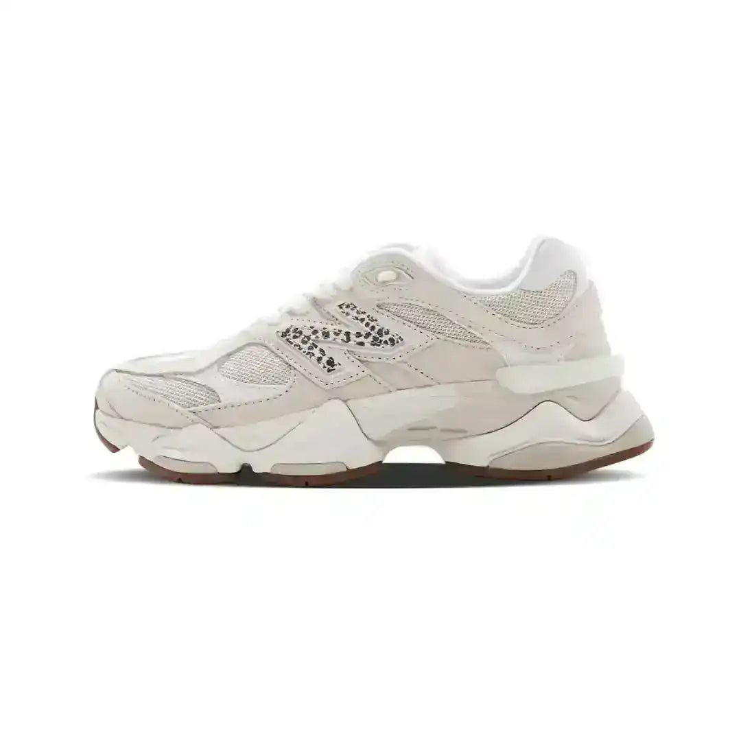 Beige 9060 sneaker in side view with leopard-print detail and a sculpted chunky sole