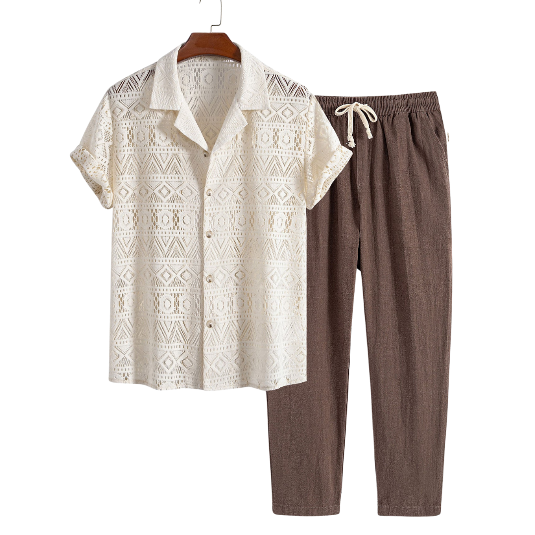 Patterned openwork short-sleeve shirt and drawstring pants, hanging product view.