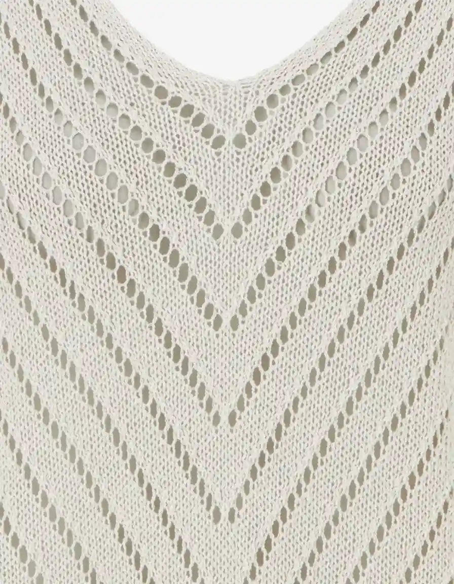 Beige V-neck knit top with a chevron openwork pattern.