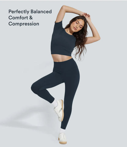 Dark high-waisted leggings, product and annotated fit-detail views.