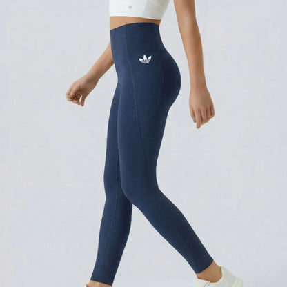 High-waisted leggings with curved seams, product and model views.