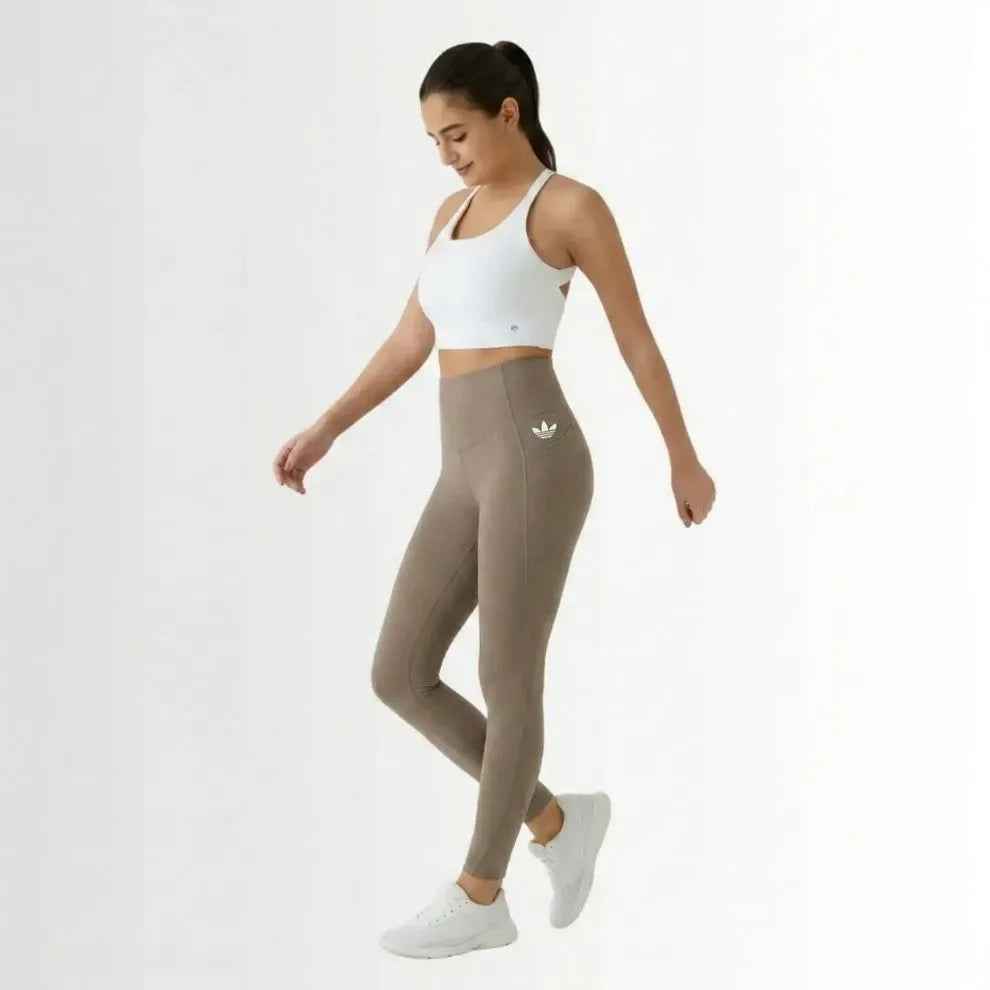 High-waisted leggings with curved seams, product and model views.