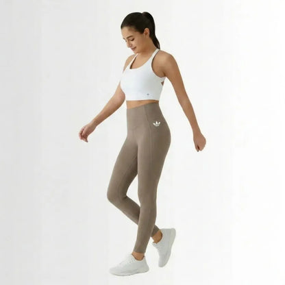 High-waisted leggings with curved seams, product and model views.