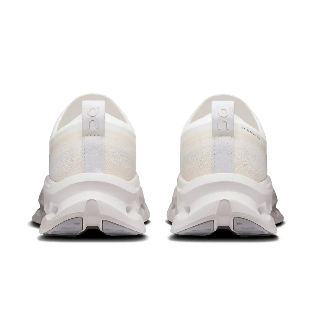 Off-white lace-up sneakers with cutout-style midsoles.