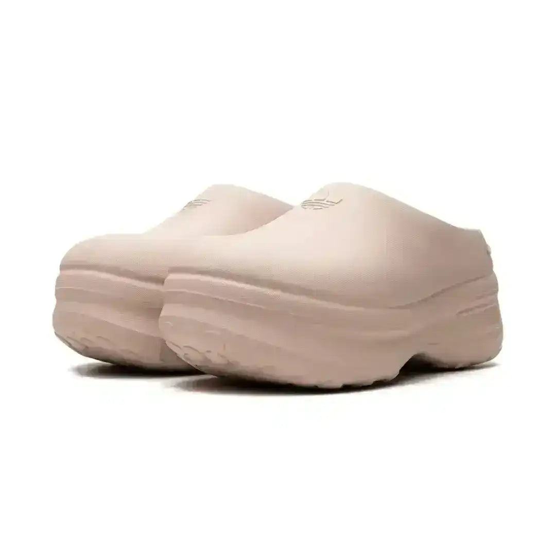 close up of chunky foam sole and trefoil logo on adidas adifom mule