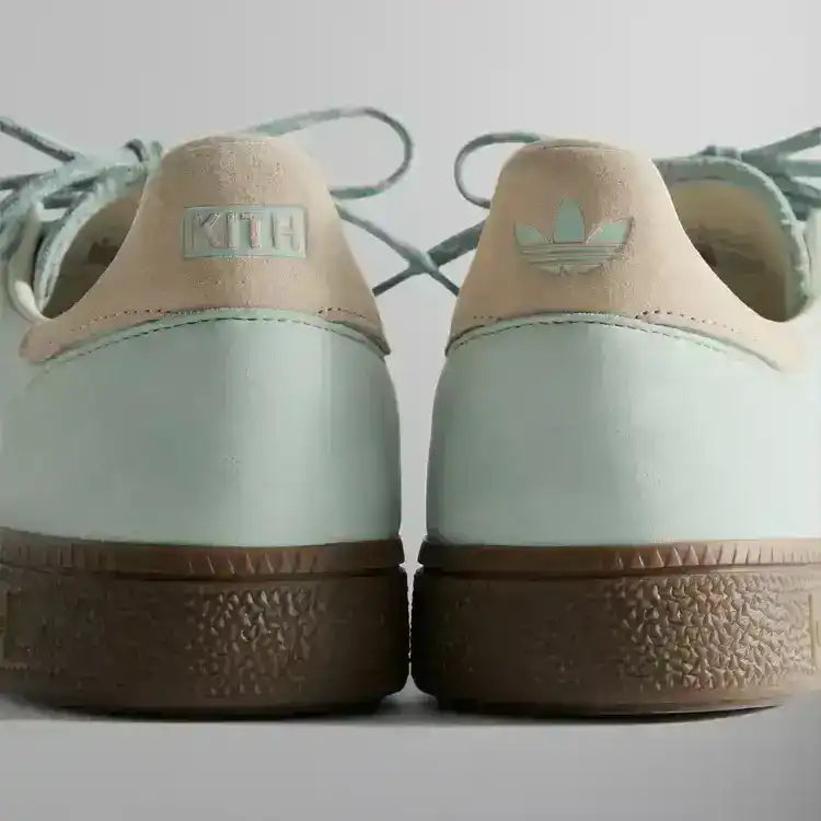 Close up of premium green suede and Kith gold foil branding