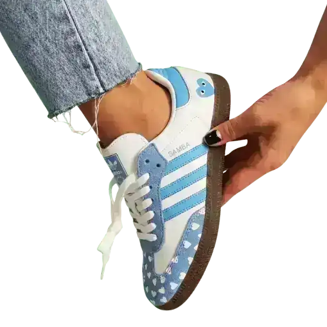 Top down angle of Adidas Love Heart Blue sneakers styled for a fresh, playful look