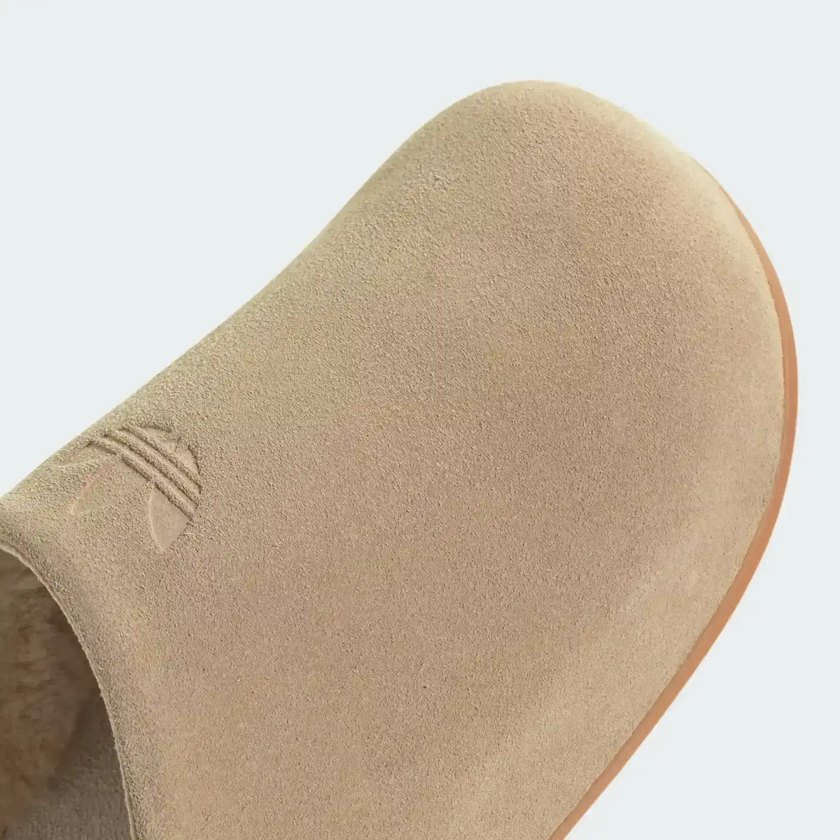 Adidas Adimule Slip-On Mules. Rounded closed toe.
