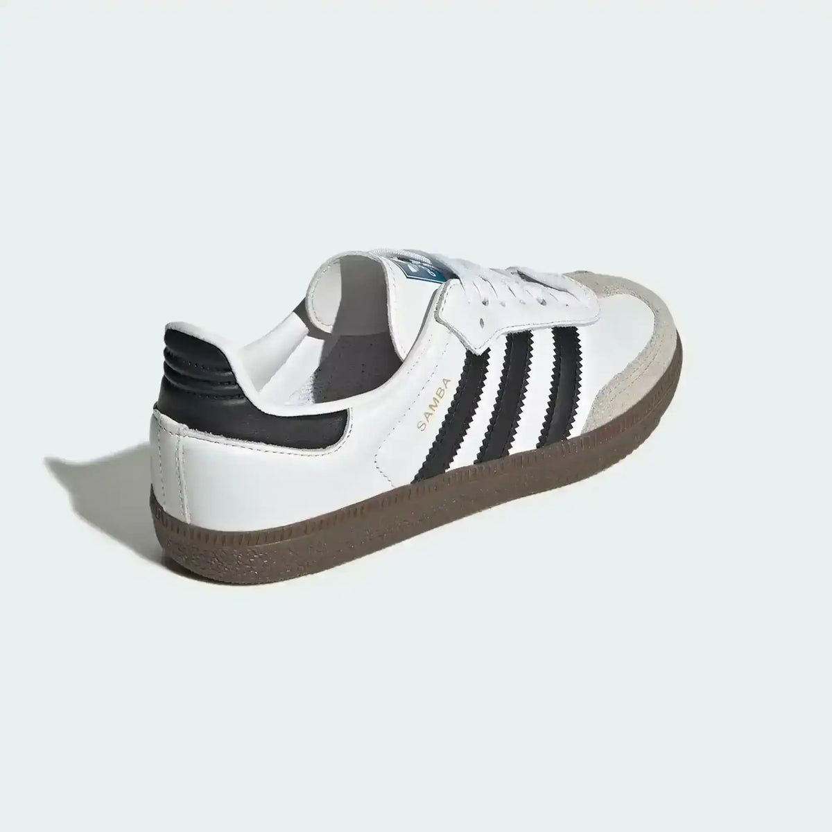Angled view of Adidas Samba OG Classic showing timeless retro soccer silhouette and grip pattern