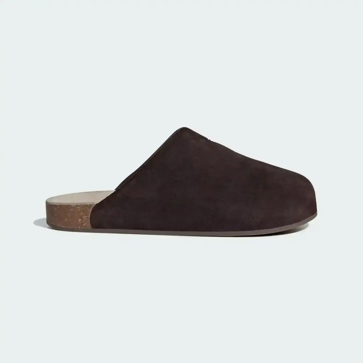 Closed-toe backless slide shoes with contrasting footbeds.