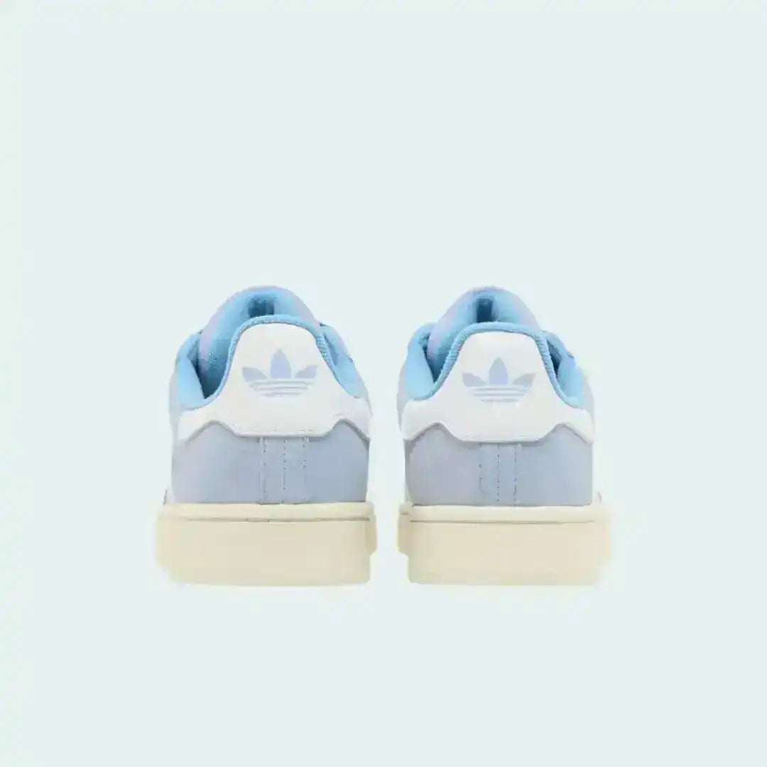 Adidas Campus 00s footwear presented in a clean studio setting, highlighting its iconic form and recognizable branding elements.