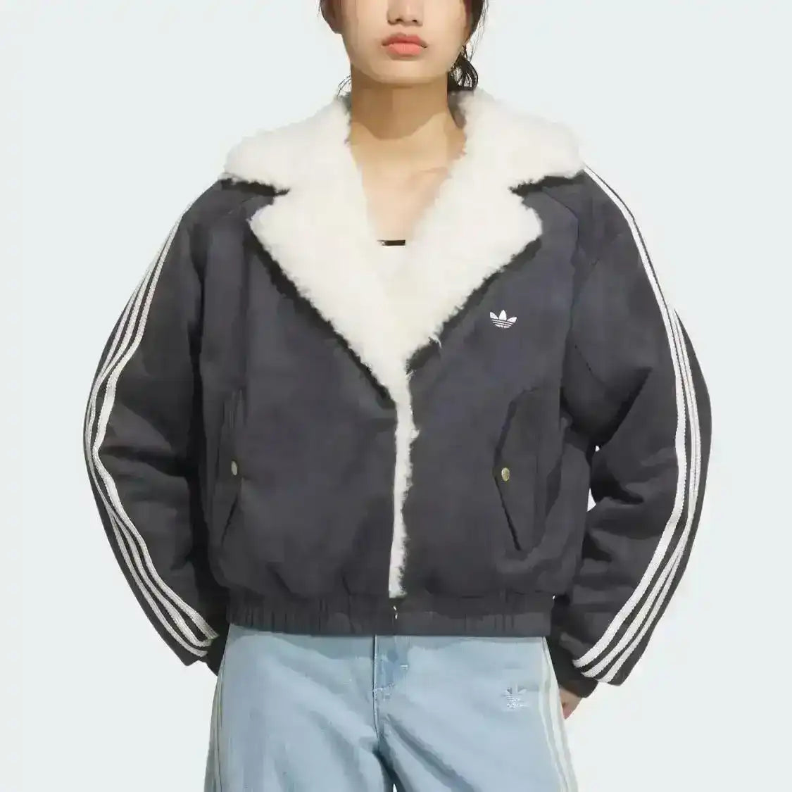 Adidas Originals sherpa jacket featuring oversized fit and classic branding
