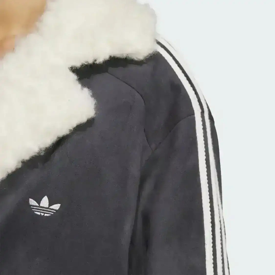 Adidas Originals jacket with sherpa lining and relaxed oversized silhouette
