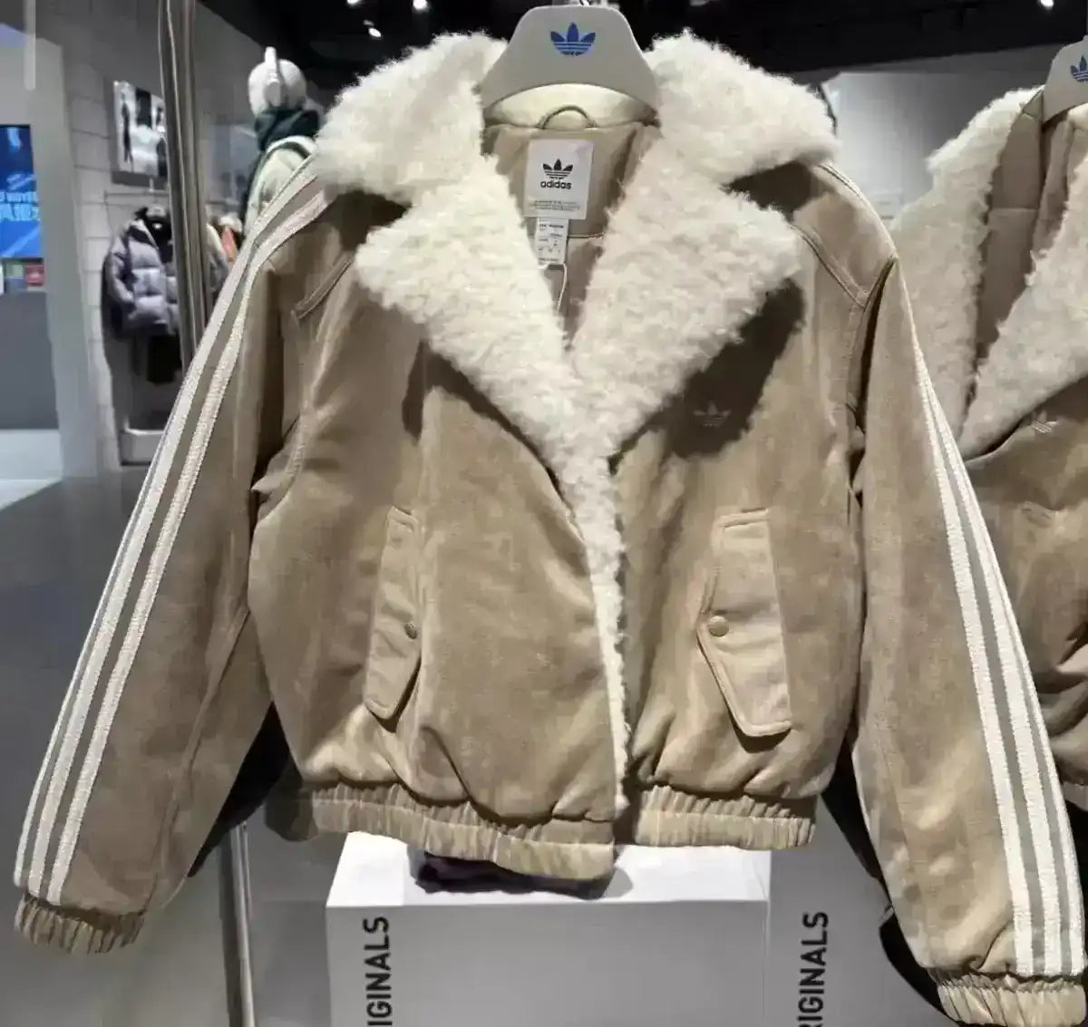 Adidas Originals oversized outerwear jacket with classic logo placement
