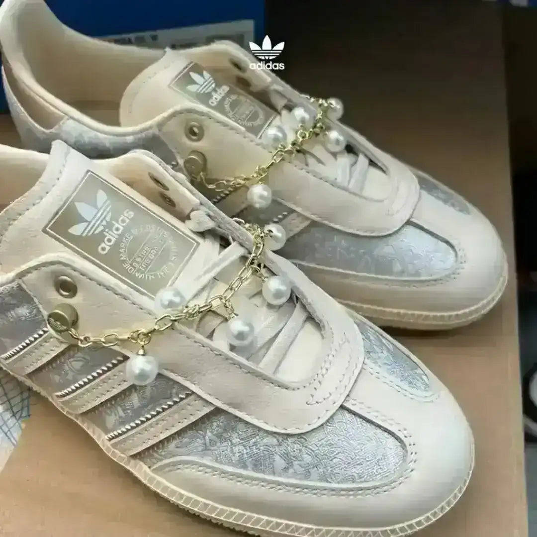Beige Adidas Samba shoes featuring brocade patterns and gold pearl accessories on laces, perfect for coquette and soft girl outfit styles.