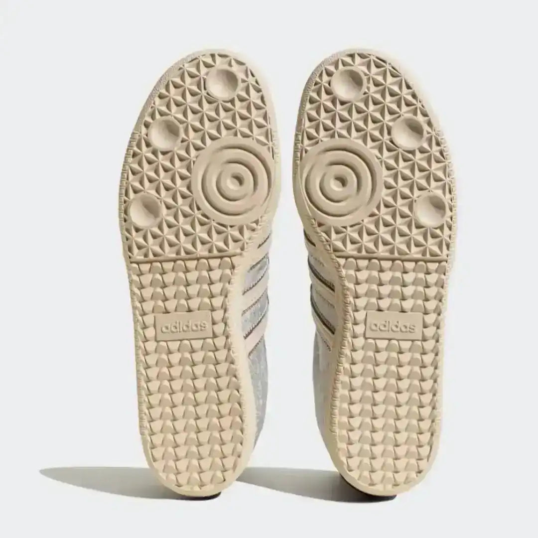 Adidas beige lifestyle shoes with pearl chain decorations, textured side panels and leather overlays that combine elegance with modern street appeal.