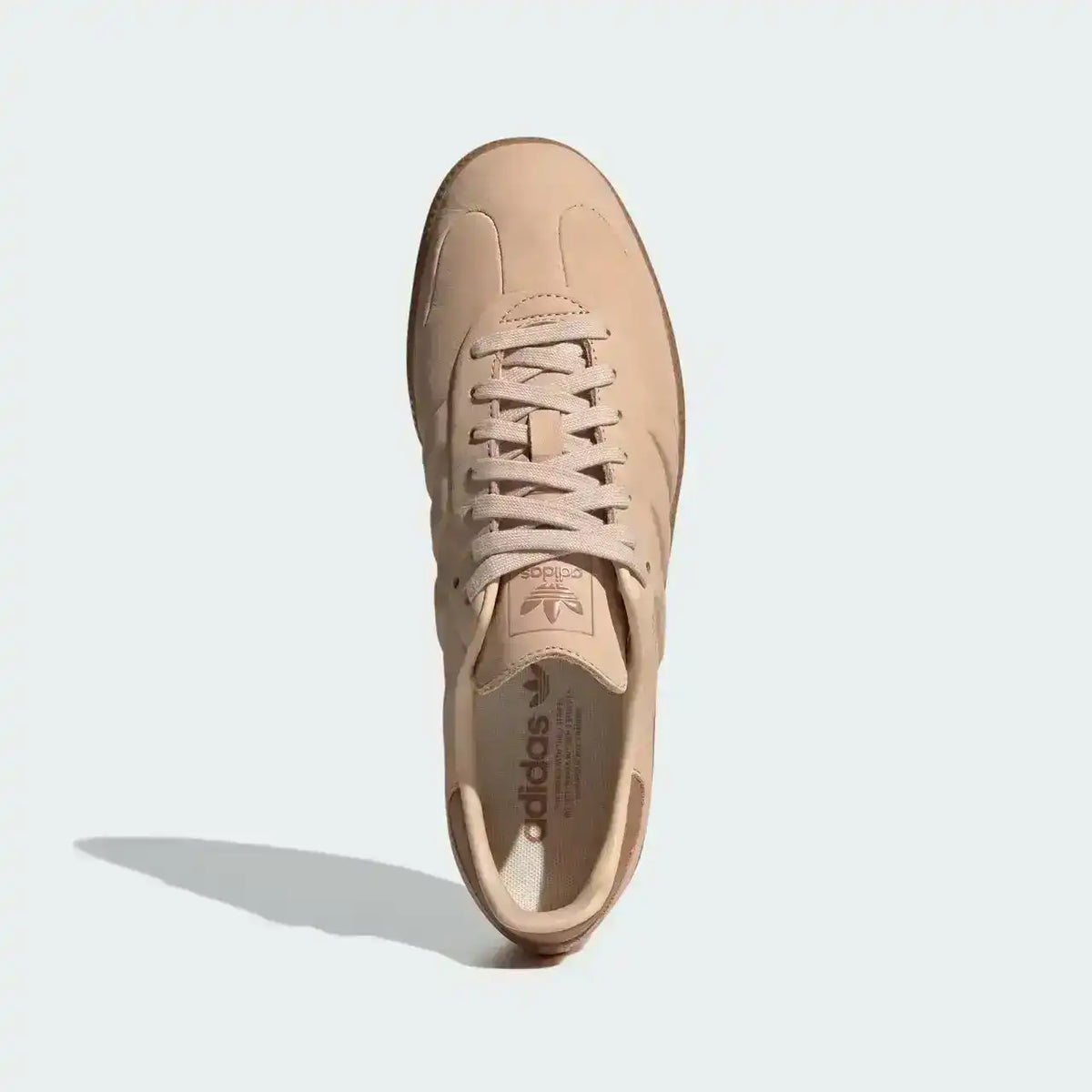 Side profile of Adidas Samba Halo Blush Gum in blush tones with textured gum sole and sleek modern silhouette for lifestyle fashion.