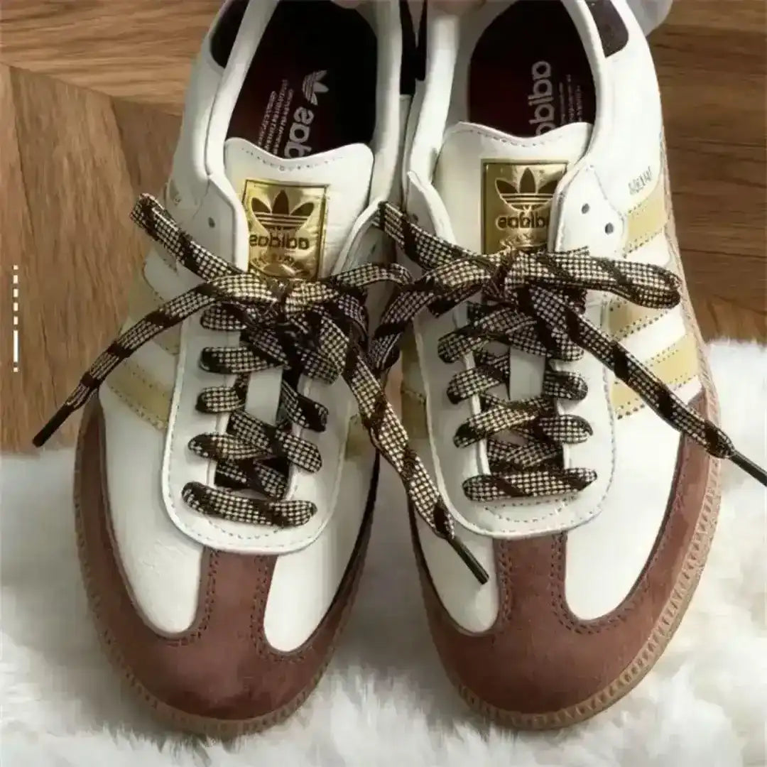Low-top three-stripe sneakers with metallic-look panels, product views.