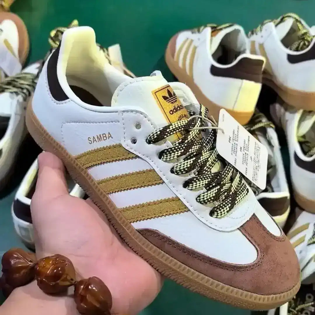 Low-top three-stripe sneakers with metallic-look panels, product views.