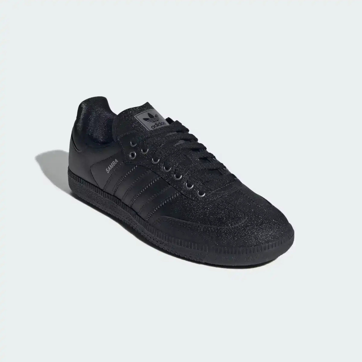 Low-top three-stripe sneakers with metallic-look panels, product views.