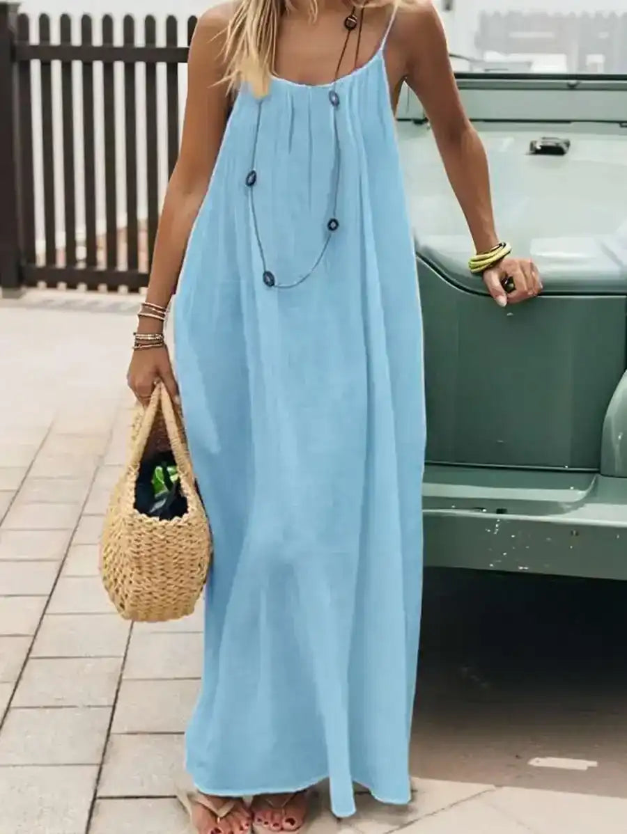 Light blue full-length strappy outfit, front model view.