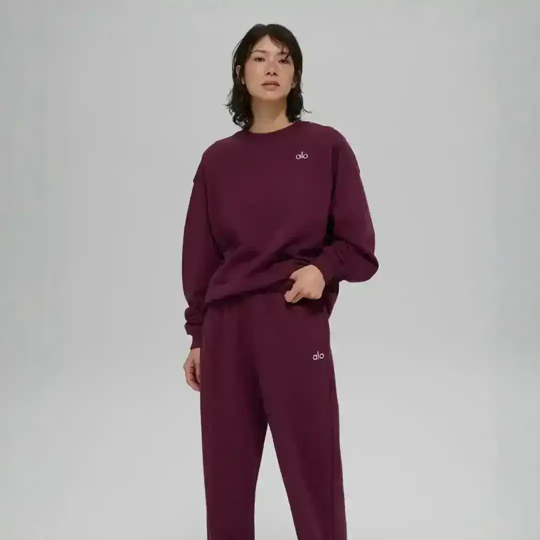 Crew-neck sweatshirt with small chest logo, product and model views.