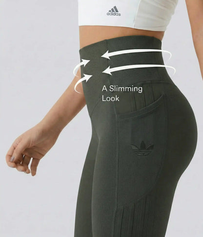 High-waisted leggings in several colors, annotated waist and seam detail.