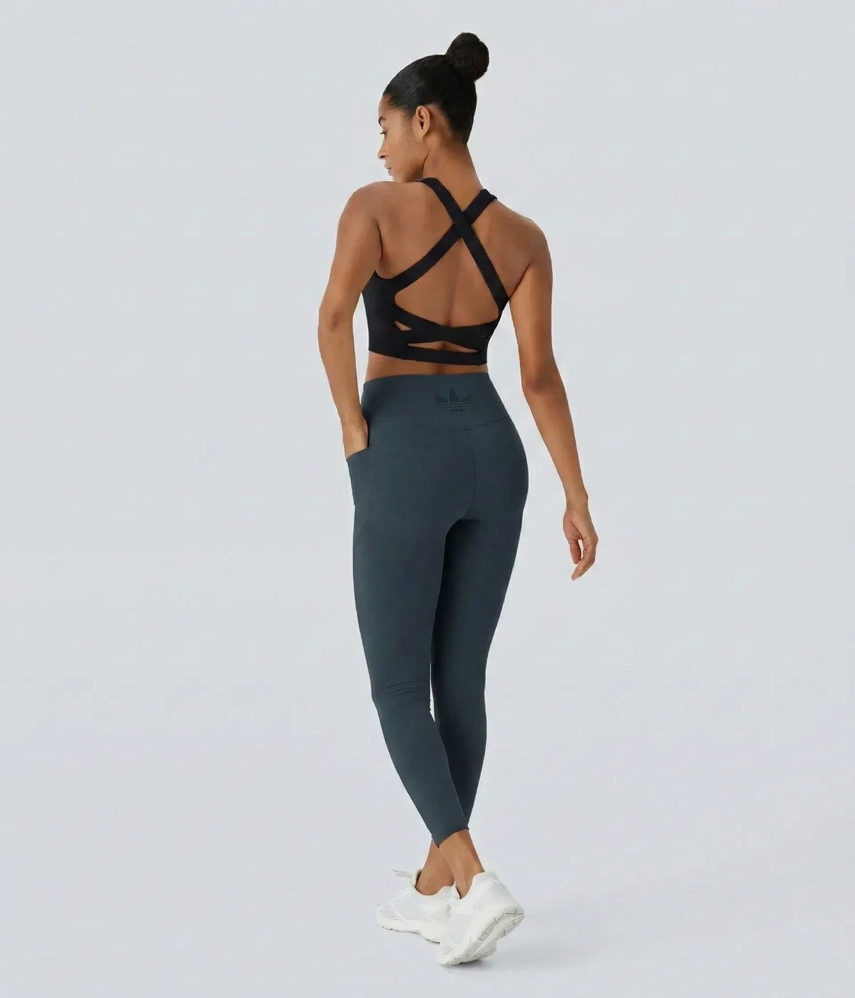 Dark high-waisted leggings, product and annotated fit-detail views.