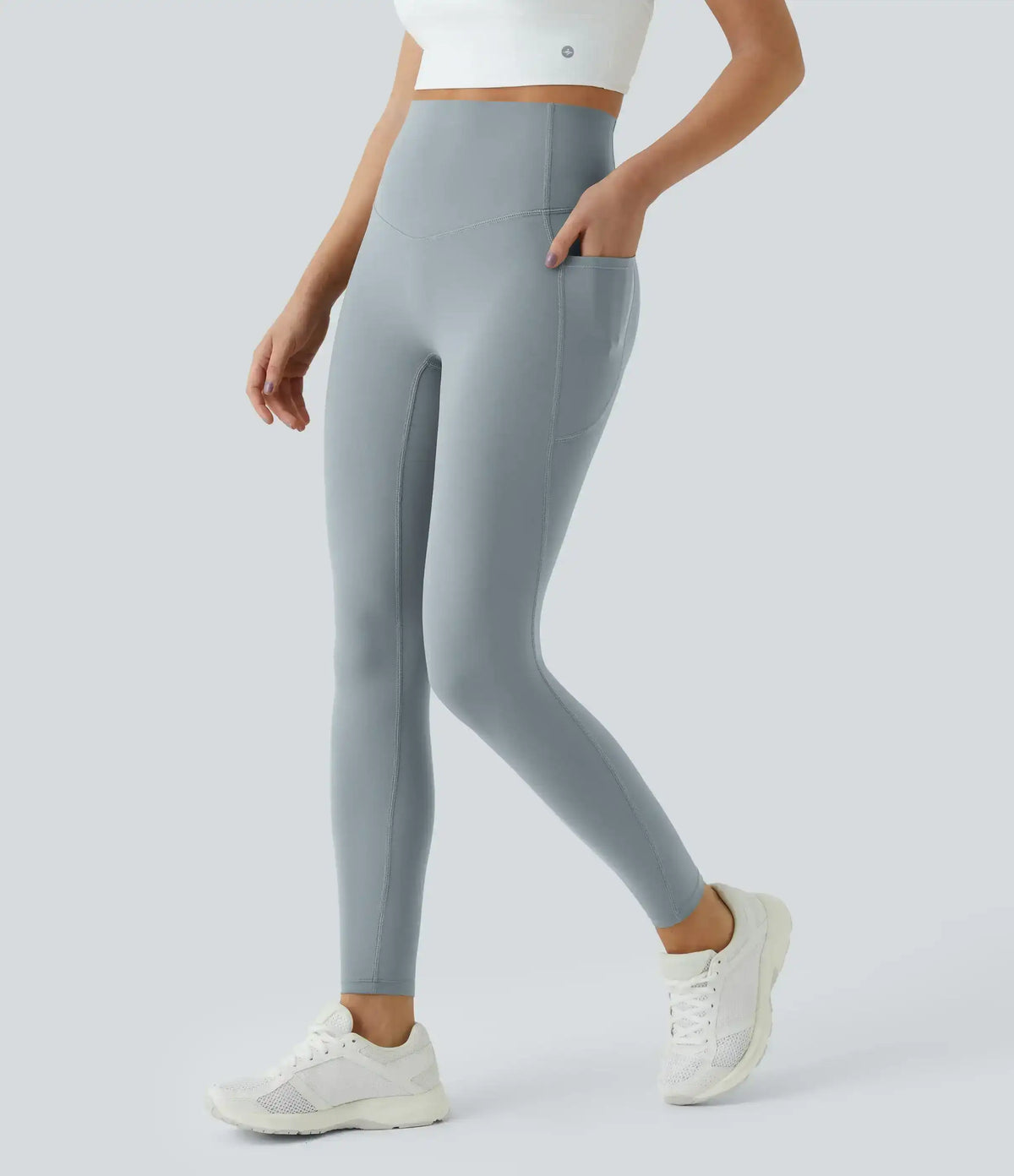High-waisted leggings with curved seams, product and model views.