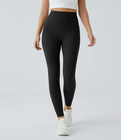 High-waisted leggings with curved seams, product and model views.