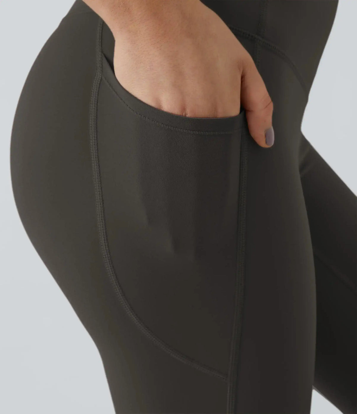 High-waisted leggings with curved seams, product and model views.