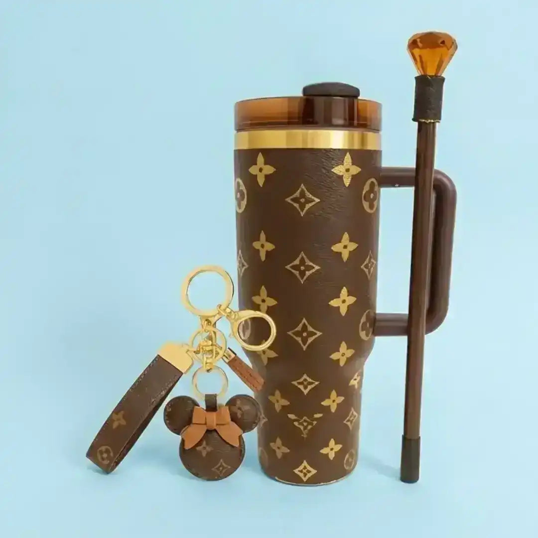 Louis Vuitton Patterned Bottle Listing. Brown patterned exterior.