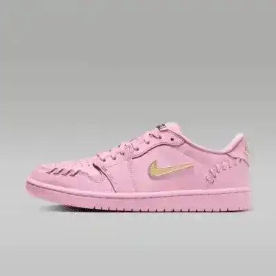 Pink low-top sneakers with gold-colored swoosh details.