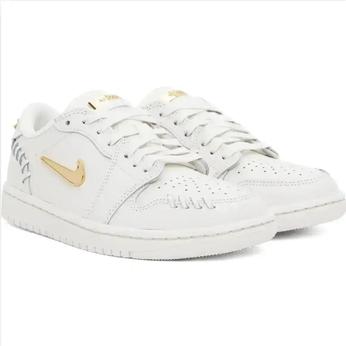 Swoosh-detail low-top sneakers, close-up and styling views.