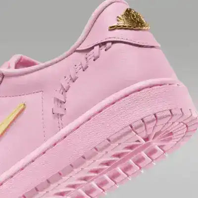 Low-top sneakers with gold-colored swoosh details, product views.