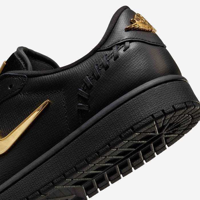 Low-top sneakers with gold-colored swoosh details, product views.